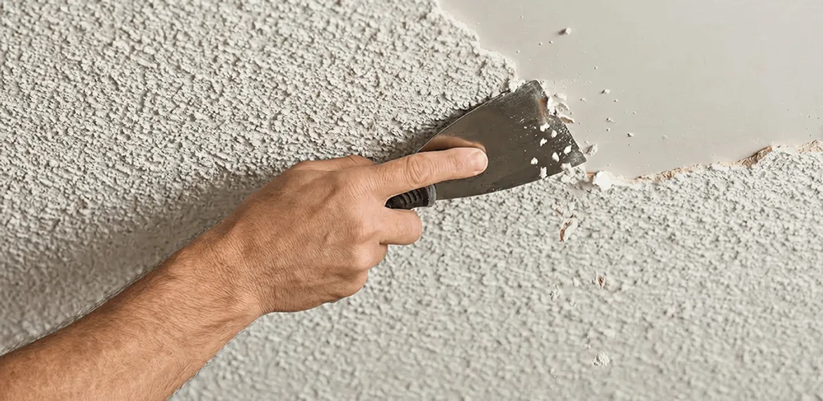 Popcorn ceiling removal scraping off textured ceiling finish in Anchorage, AK